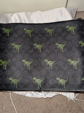 Coach Black Zip Pouch with Green Dinosaur Motif